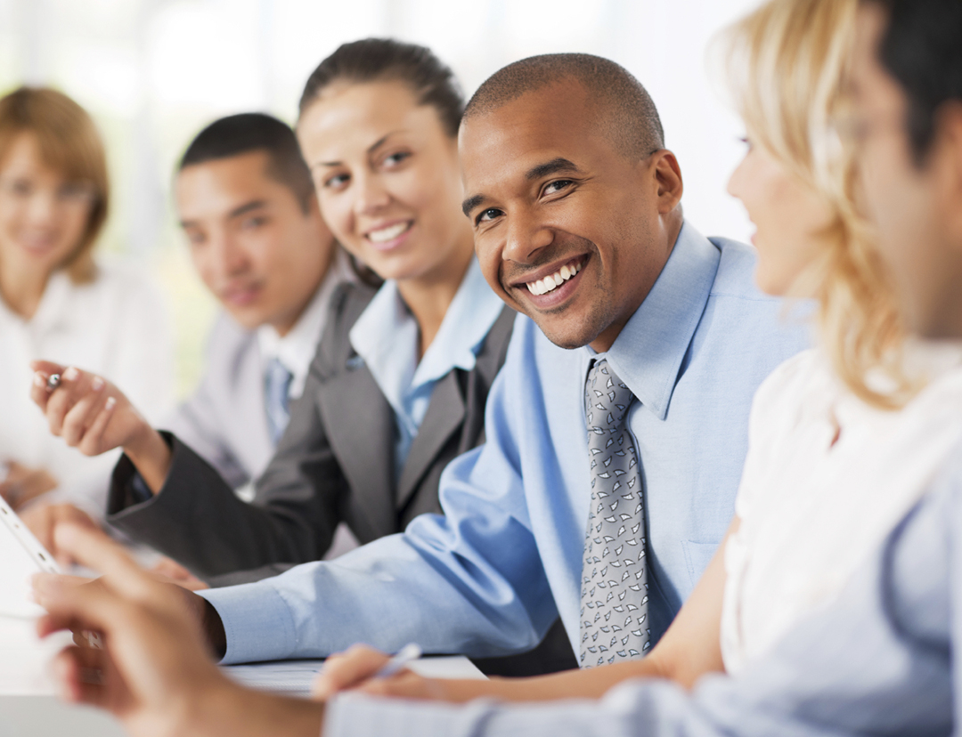 Large group of business people sitting in a row and communicating.  The focus is on African-American looking at the camera. 

[url=http://www.istockphoto.com/search/lightbox/9786622][img]http://dl.dropbox.com/u/40117171/business.jpg[/img][/url]

[url=http://www.istockphoto.com/search/lightbox/9786738][img]http://dl.dropbox.com/u/40117171/group.jpg[/img][/url]